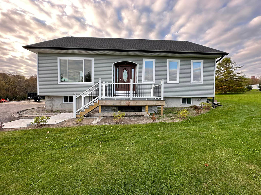 Adding Bold Black 6-Inch Gutters to New Home in Schuyler, NY